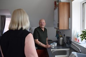 Russell and Nicky in their home