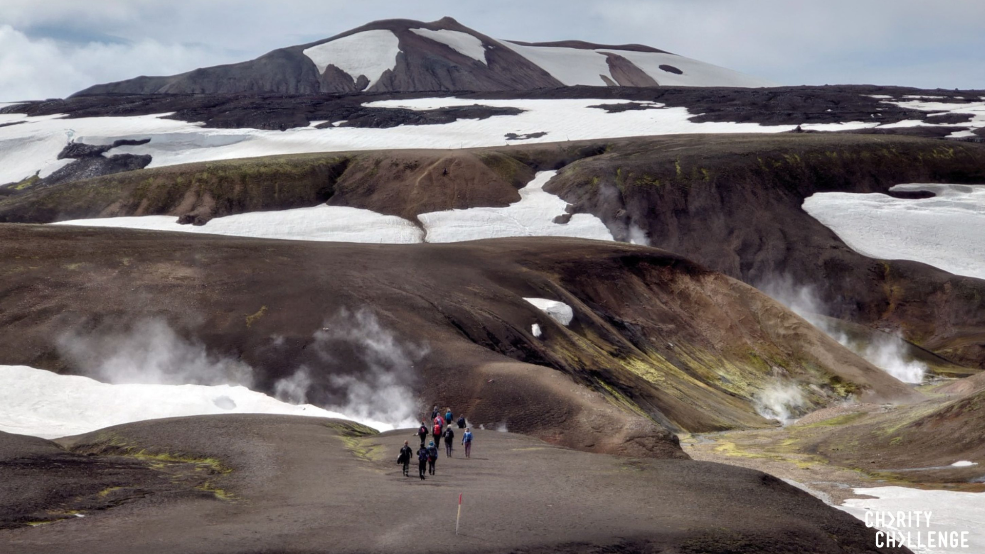Icelandic Lava Trek - people trekking in Iceland Mountains.